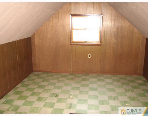 70 Tunison Road New Brunswick, NJ 08901 - Photo 2 of 3 a view of an empty room with a window