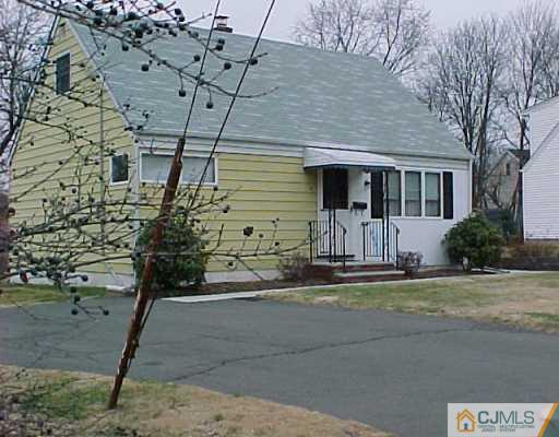 70 Tunison Road New Brunswick, NJ 08901 - Photo 3 of 3 a front view of a house with a yard