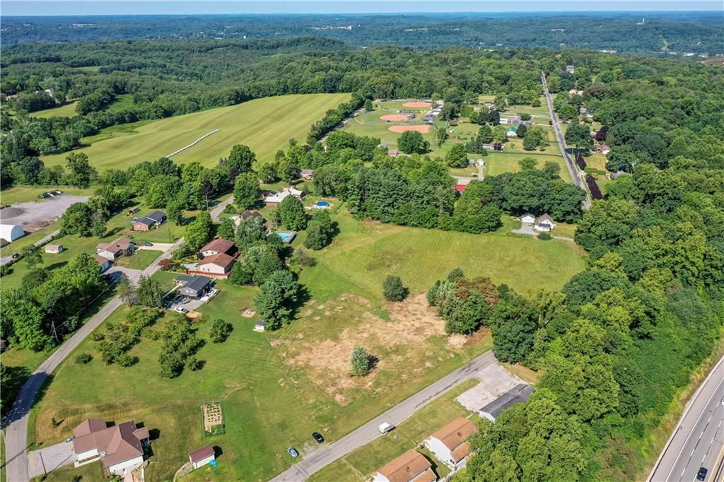 110 Douglass Road Beaver Falls, PA 15010 - Photo 7 of 15 an aerial view of mountain with residential house and ocean view