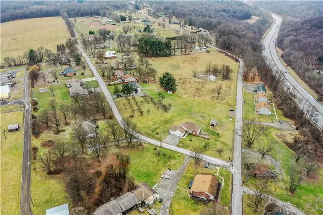 a view of a swimming pool and an outdoor space