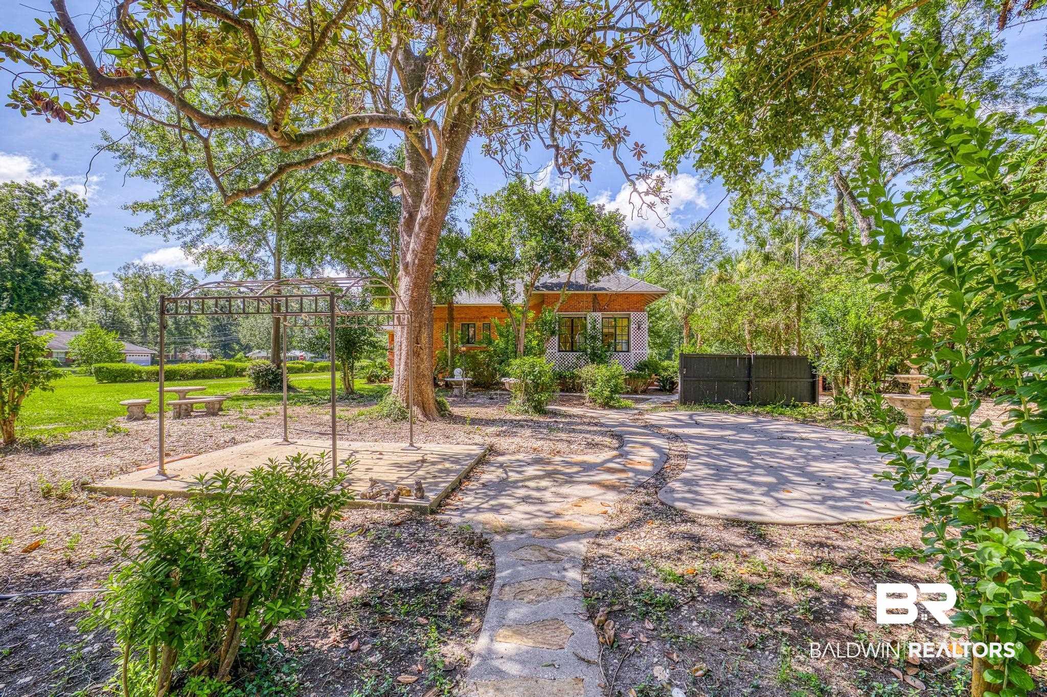 1701 Sowell Road Brewton, AL 36426 - Photo 16 of 83 View of yard featuring a patio area