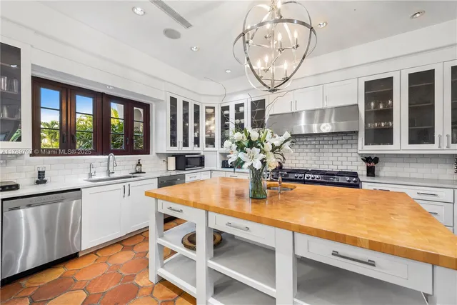 a living room with furniture large window and flat screen tv
