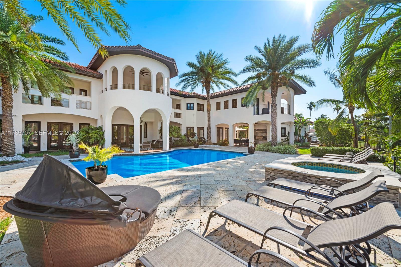 1201 Northeast 83rd Street Miami, FL 33138 - Photo 2 of 67 a front view of house with yard and swimming pool