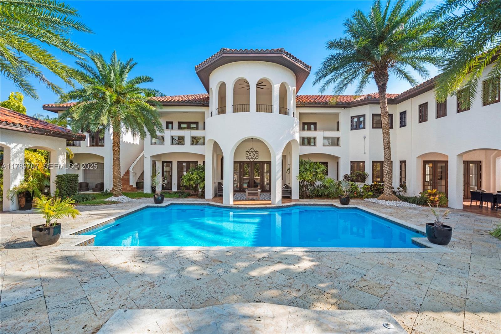 1201 Northeast 83rd Street Miami, FL 33138 - Photo 3 of 67 a front view of a house with yard and swimming pool