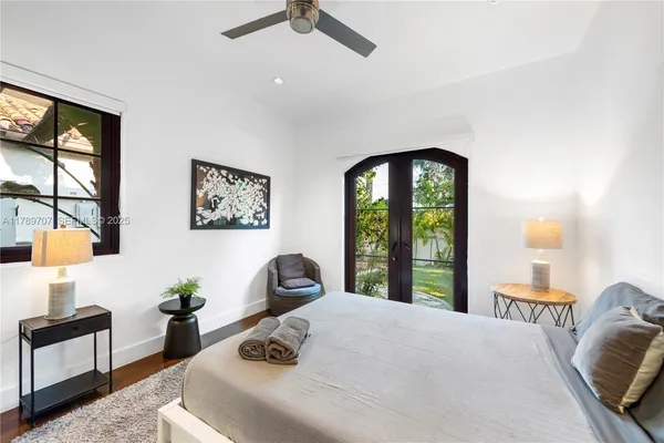 a bathroom with a sink mirror toilet and bathtub