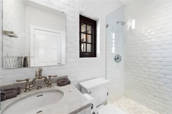 a front view of house with yard outdoor seating and barbeque oven