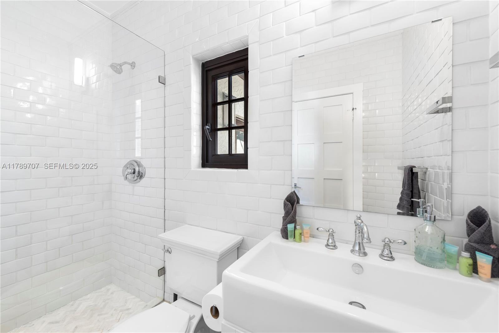 1201 Northeast 83rd Street Miami, FL 33138 - Photo 48 of 67 a bathroom with a sink toilet and shower