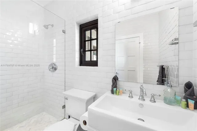 a swimming pool with outdoor seating and yard