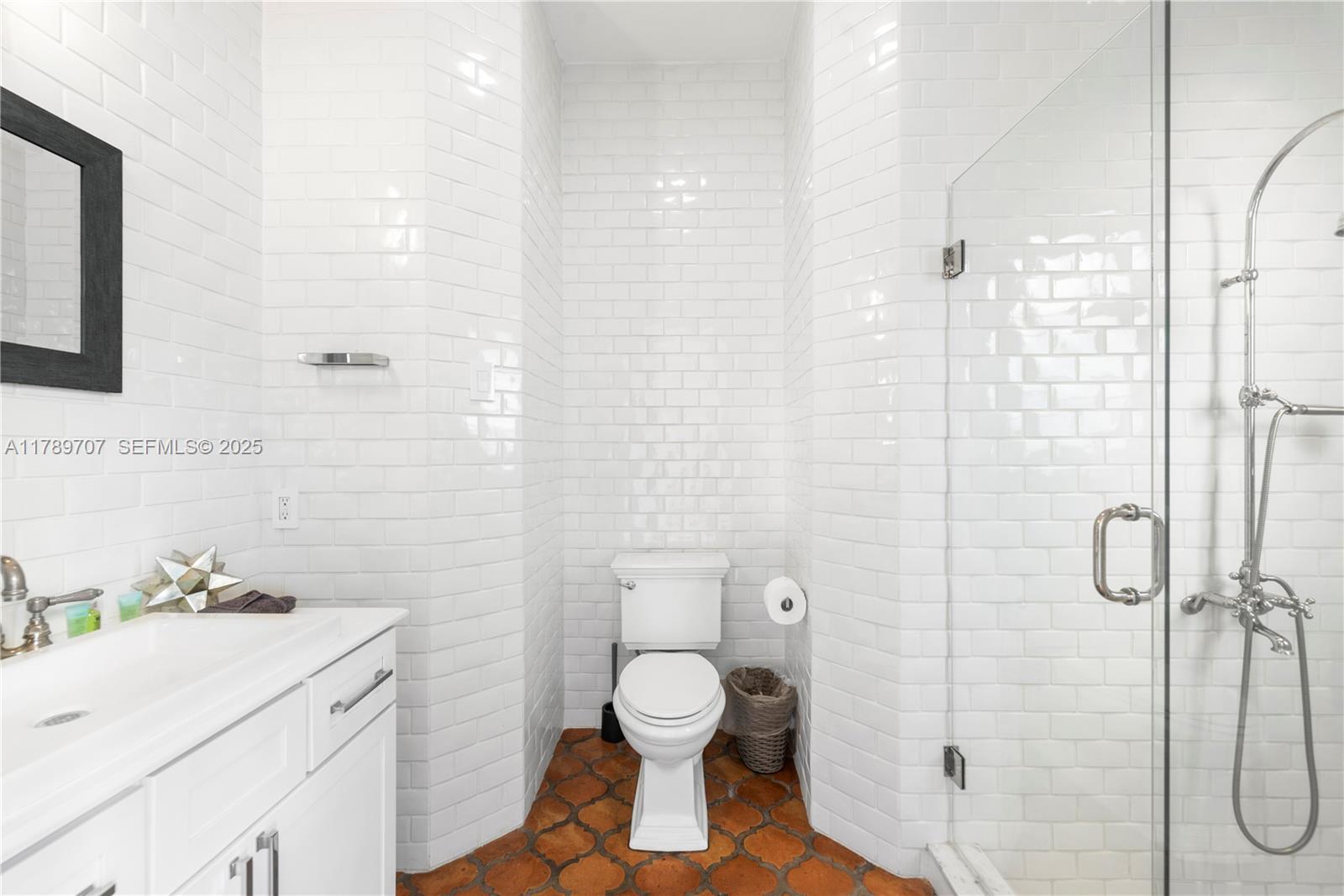 1201 Northeast 83rd Street Miami, FL 33138 - Photo 52 of 67 a bathroom with a granite countertop sink toilet and shower