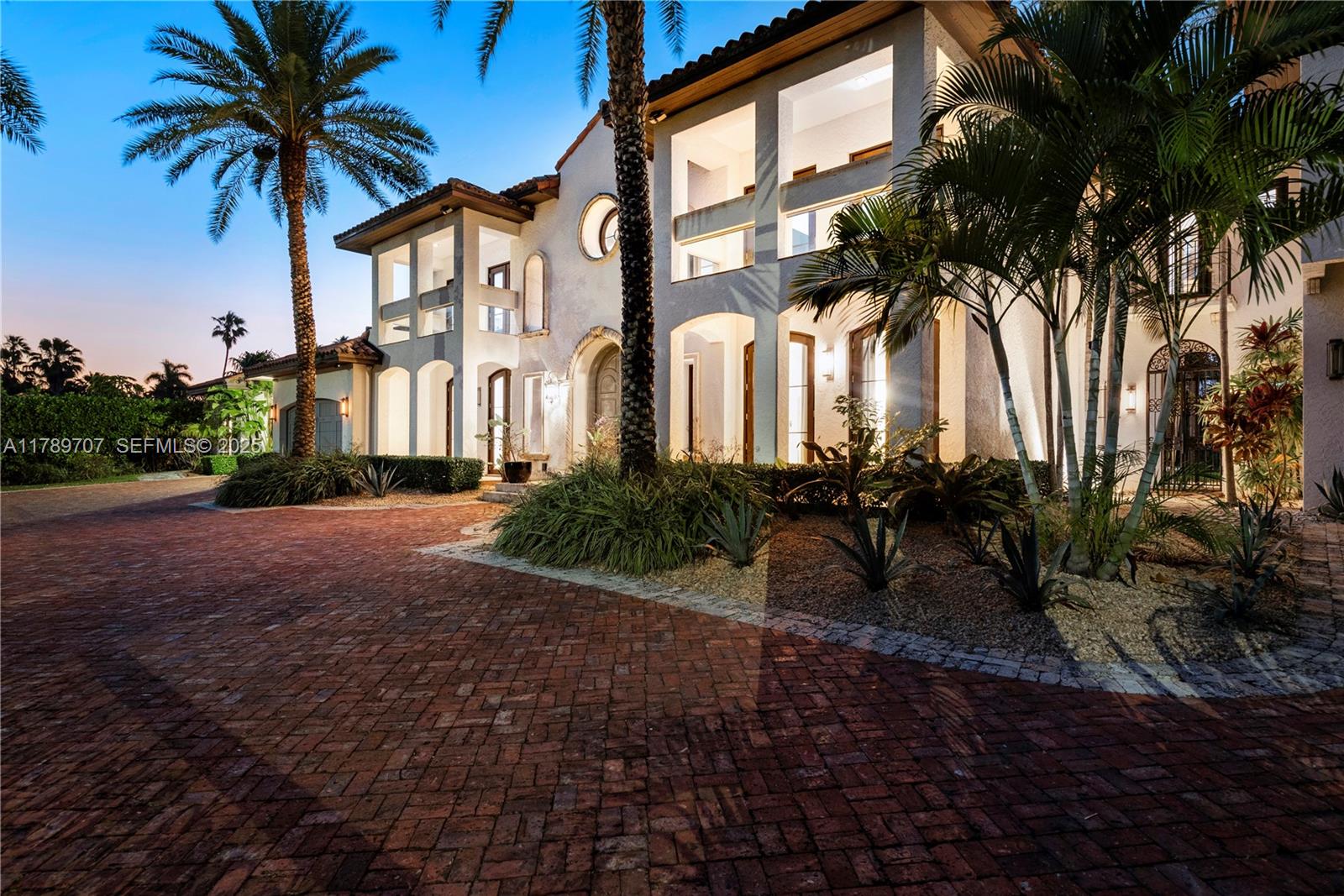 1201 Northeast 83rd Street Miami, FL 33138 - Photo 60 of 67 a couple of palm trees in front of house