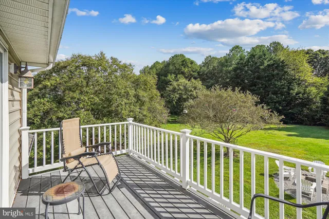 a view of a chairs on the roof deck