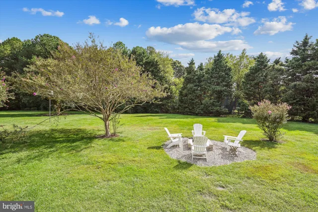 a view of a lake with a sitting area