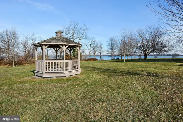 a view of a tiny house with a yard