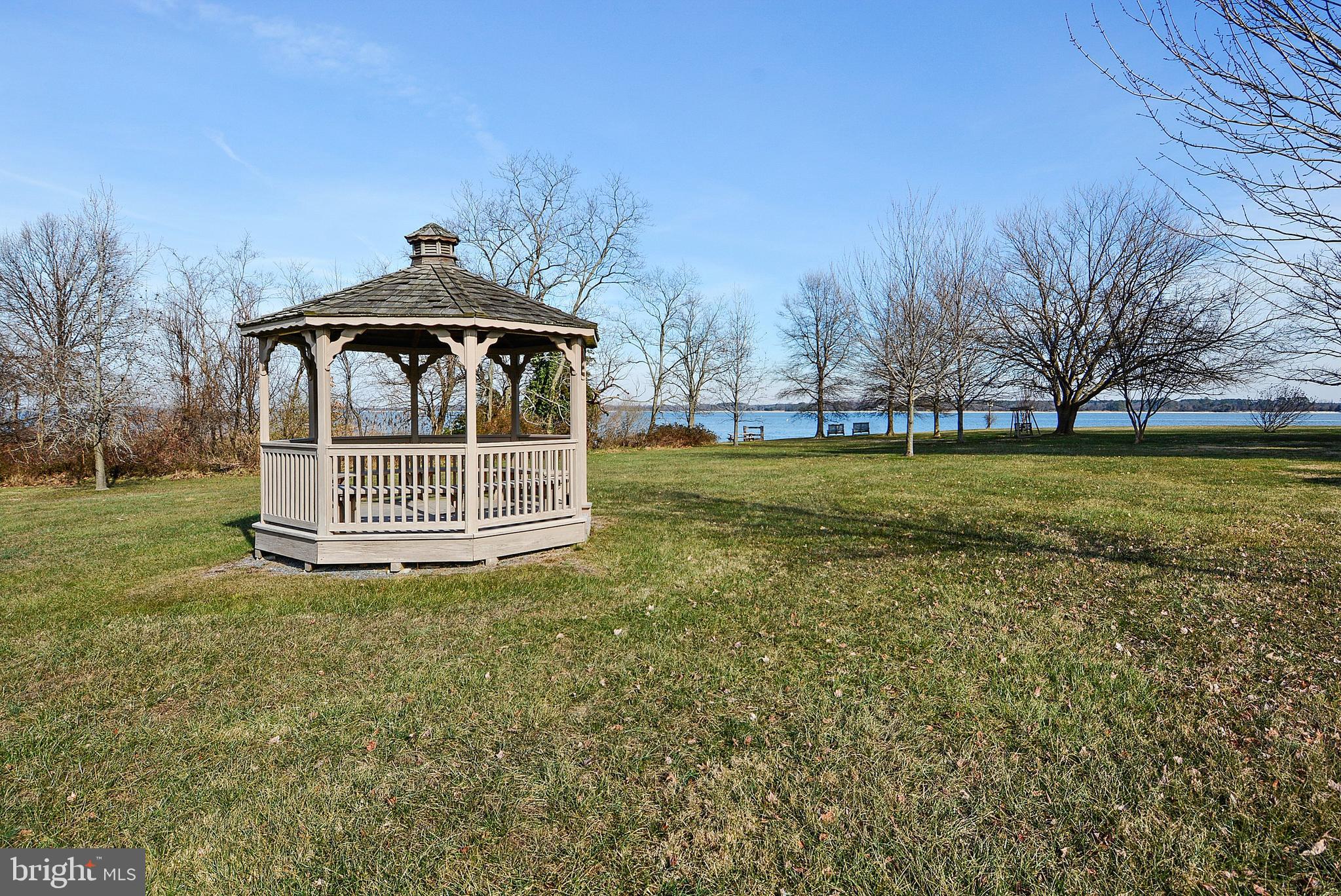 24749 Swan Road St. Michaels, MD 21663 - Photo 42 of 43 a view of a tiny house with a yard