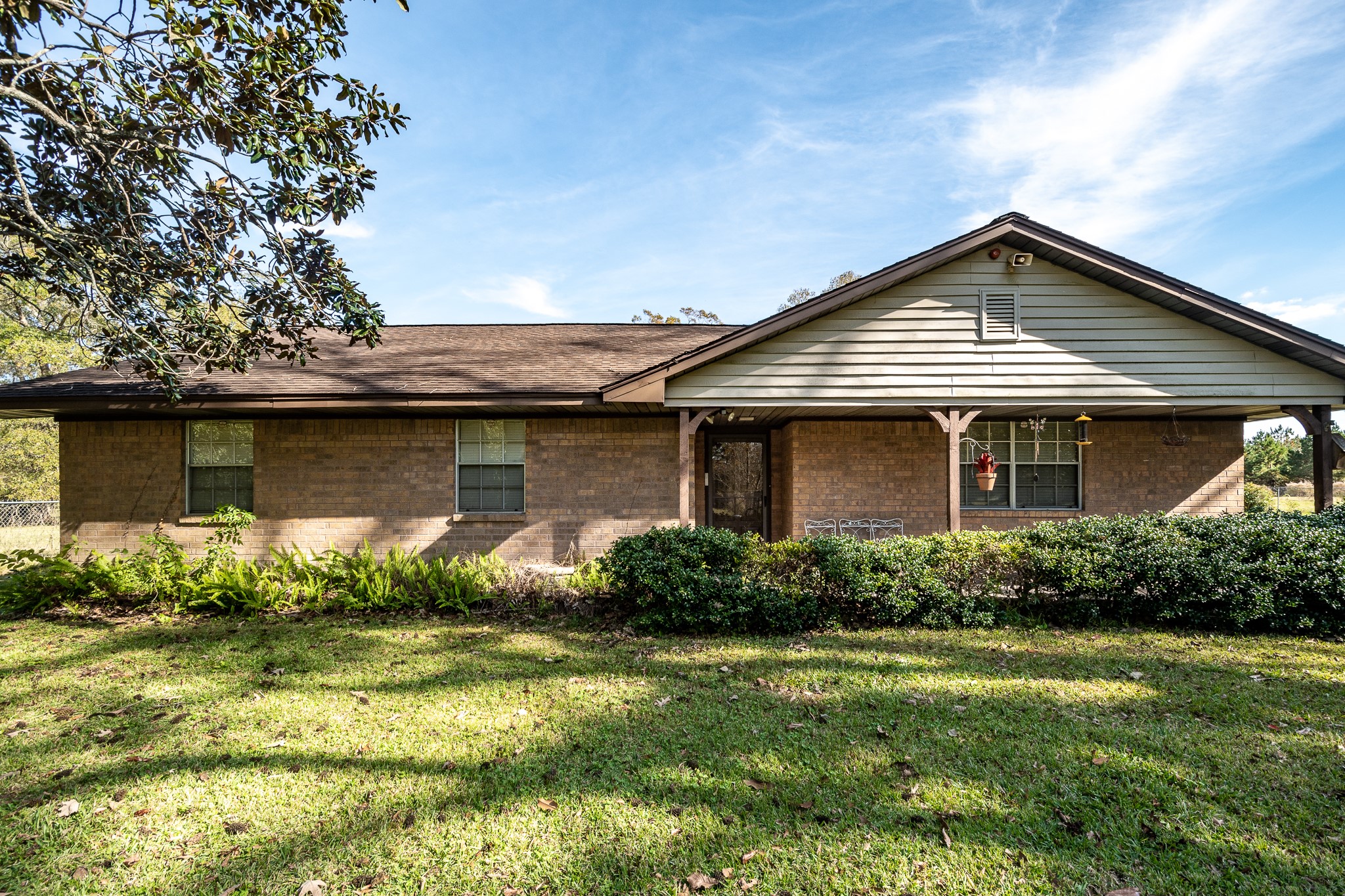 10488 Fostoria Road Cleveland, TX 77328 - Photo 1 of 16 front view of a house with a yard
