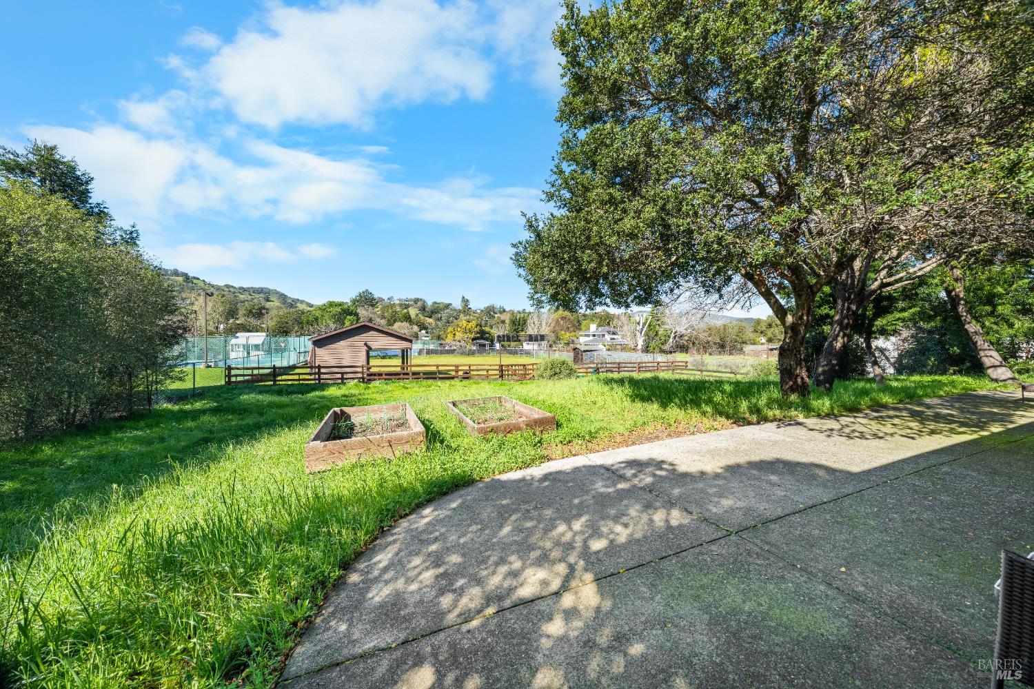 8 Circle Road San Rafael, CA 94903 - Photo 36 of 45 a view of a street with a big yard and potted plants