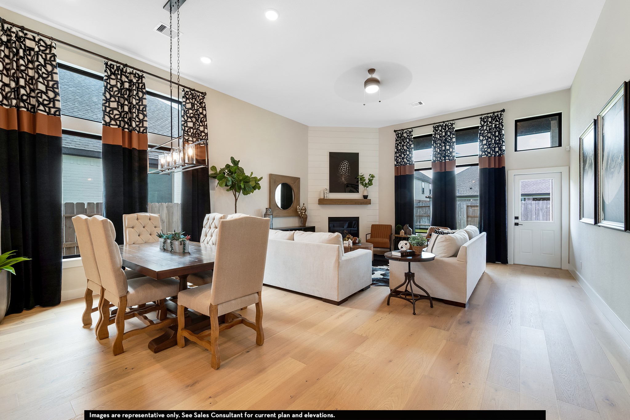 1923 Parks Edge Lane Angleton, TX 77515 - Photo 11 of 30 a living room with furniture dining table and a flat screen tv