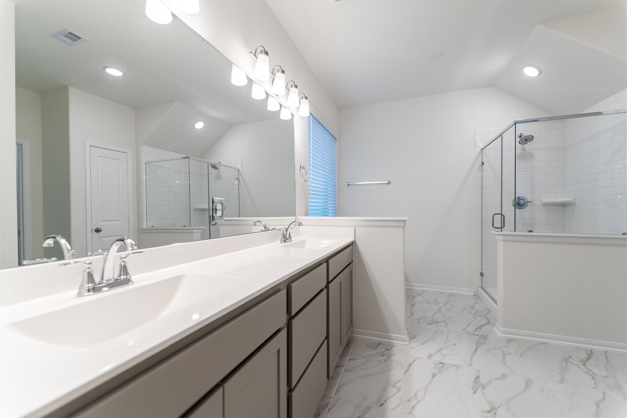 1923 Parks Edge Lane Angleton, TX 77515 - Photo 14 of 25 a bathroom with a sink double vanity and a mirror