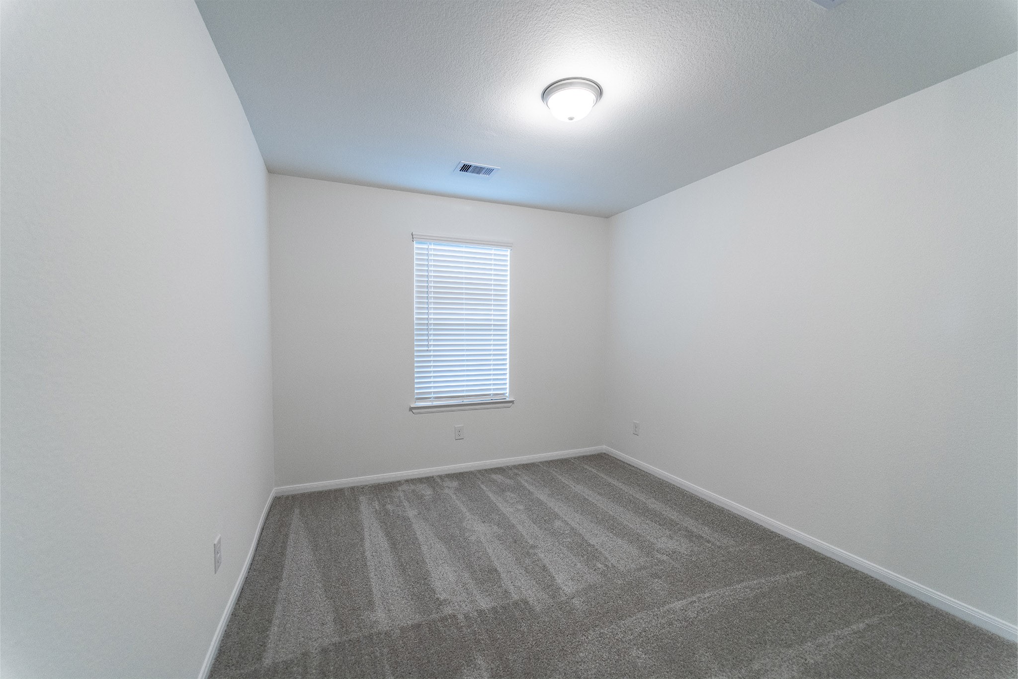1923 Parks Edge Lane Angleton, TX 77515 - Photo 19 of 25 an empty room with a window