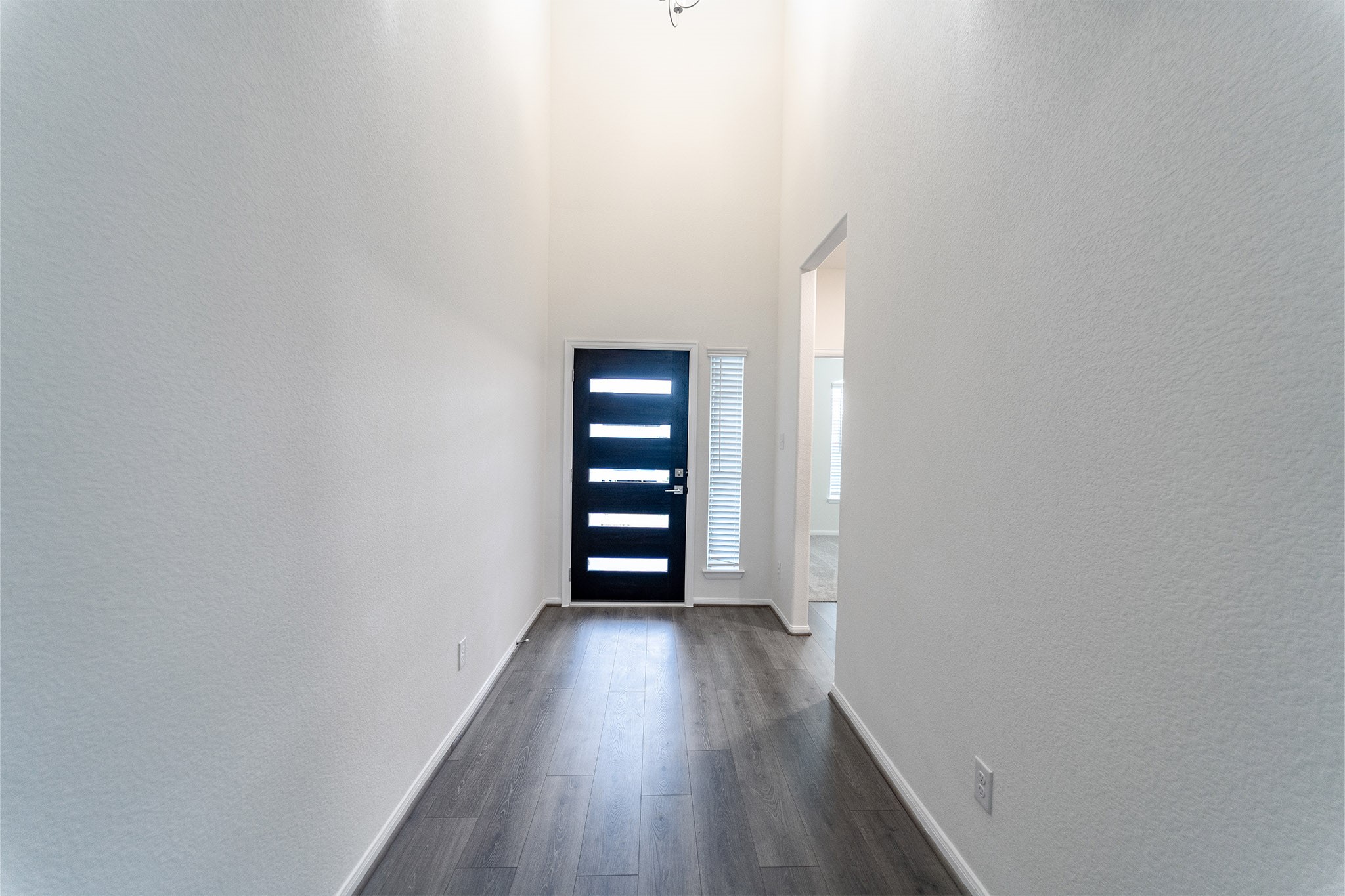 1923 Parks Edge Lane Angleton, TX 77515 - Photo 2 of 25 a view of wooden floor in a room