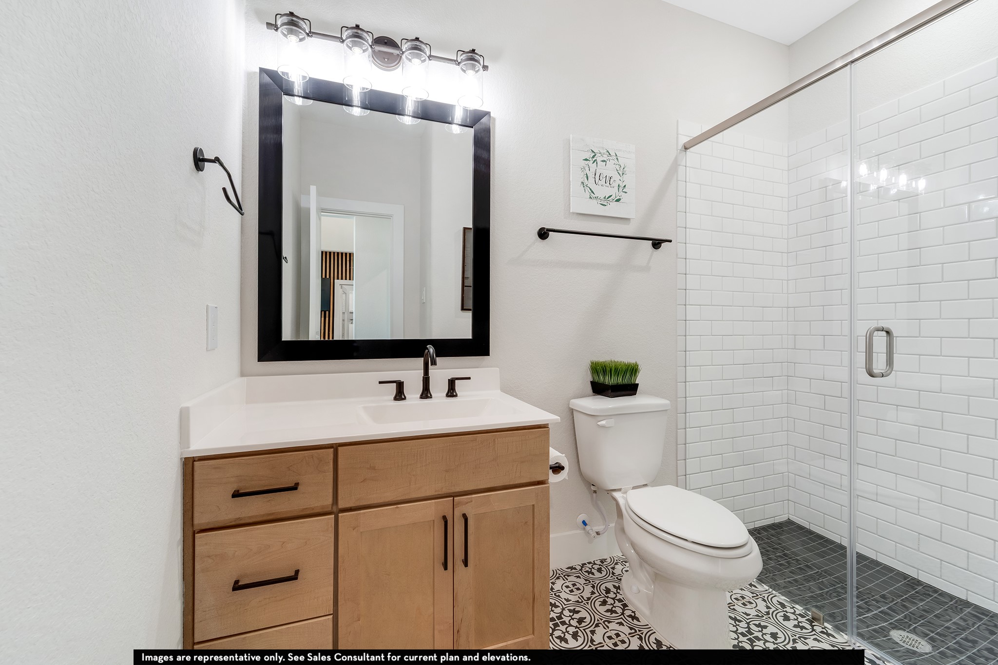 1923 Parks Edge Lane Angleton, TX 77515 - Photo 23 of 30 a bathroom with a toilet sink and mirror