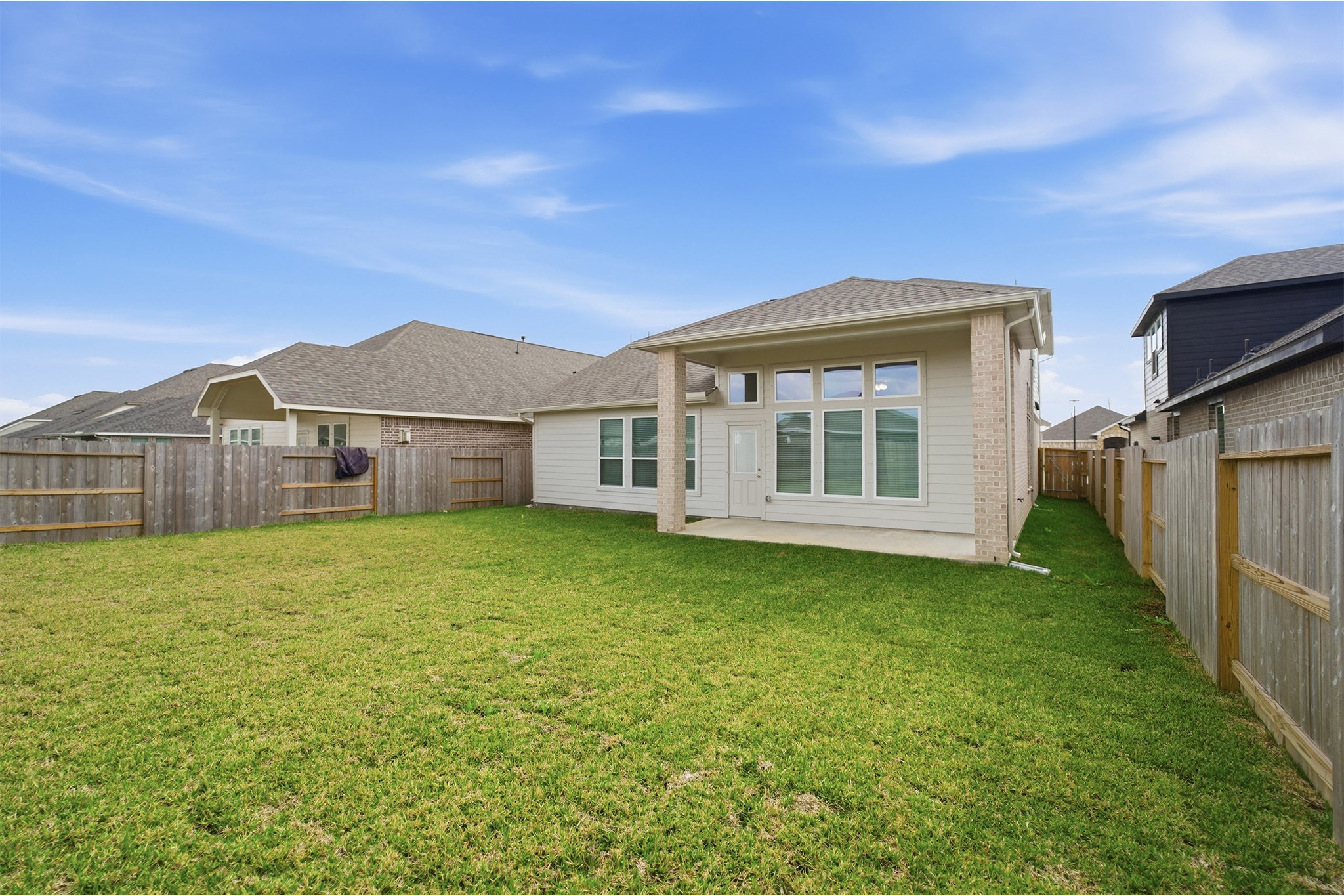 1923 Parks Edge Lane Angleton, TX 77515 - Photo 25 of 25 a view of a house with backyard and garden