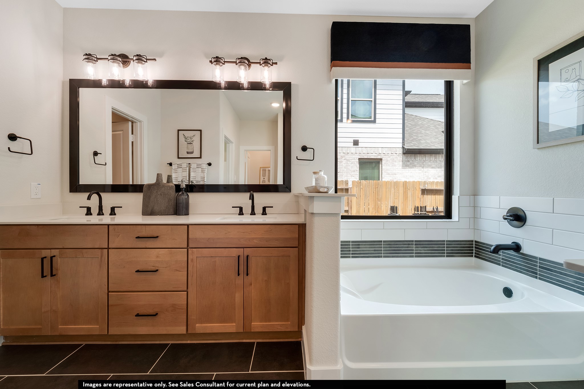 1923 Parks Edge Lane Angleton, TX 77515 - Photo 26 of 30 a spacious bathroom with a bathtub sink and mirror