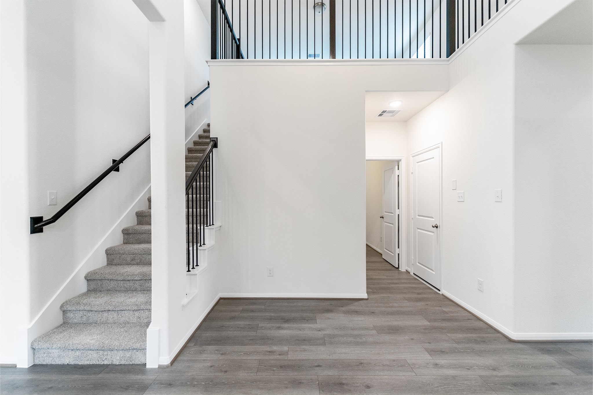 1923 Parks Edge Lane Angleton, TX 77515 - Photo 3 of 25 a view of an entryway with wooden floor