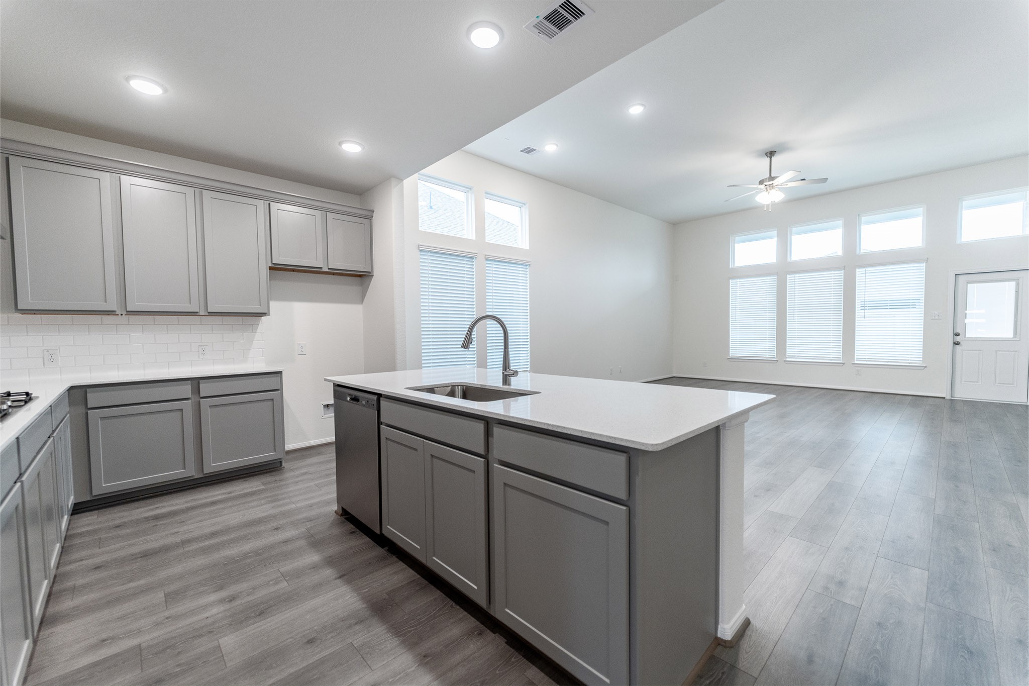 1923 Parks Edge Lane Angleton, TX 77515 - Photo 7 of 25 a kitchen with sink stove and cabinets