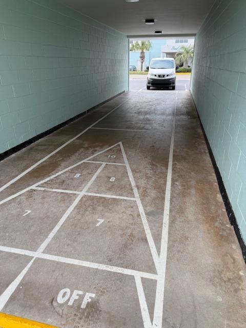 885 Santa Rosa Boulevard, Unit 111A Fort Walton Beach, FL 32548 - Photo 15 of 16 a view of car parked in garage