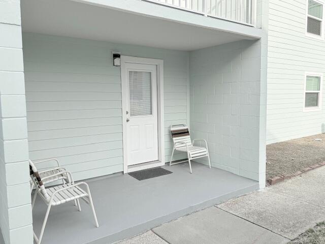 885 Santa Rosa Boulevard, Unit 111A Fort Walton Beach, FL 32548 - Photo 7 of 16 a view of outdoor space with seating space