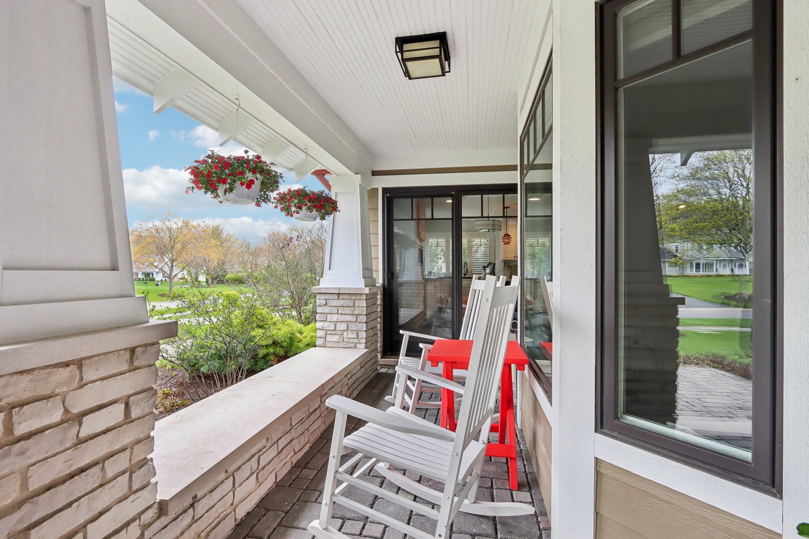 598 Rockefeller Road Lake Forest, IL 60045 - Photo 16 of 86 a view of a balcony with couch and floor to ceiling window