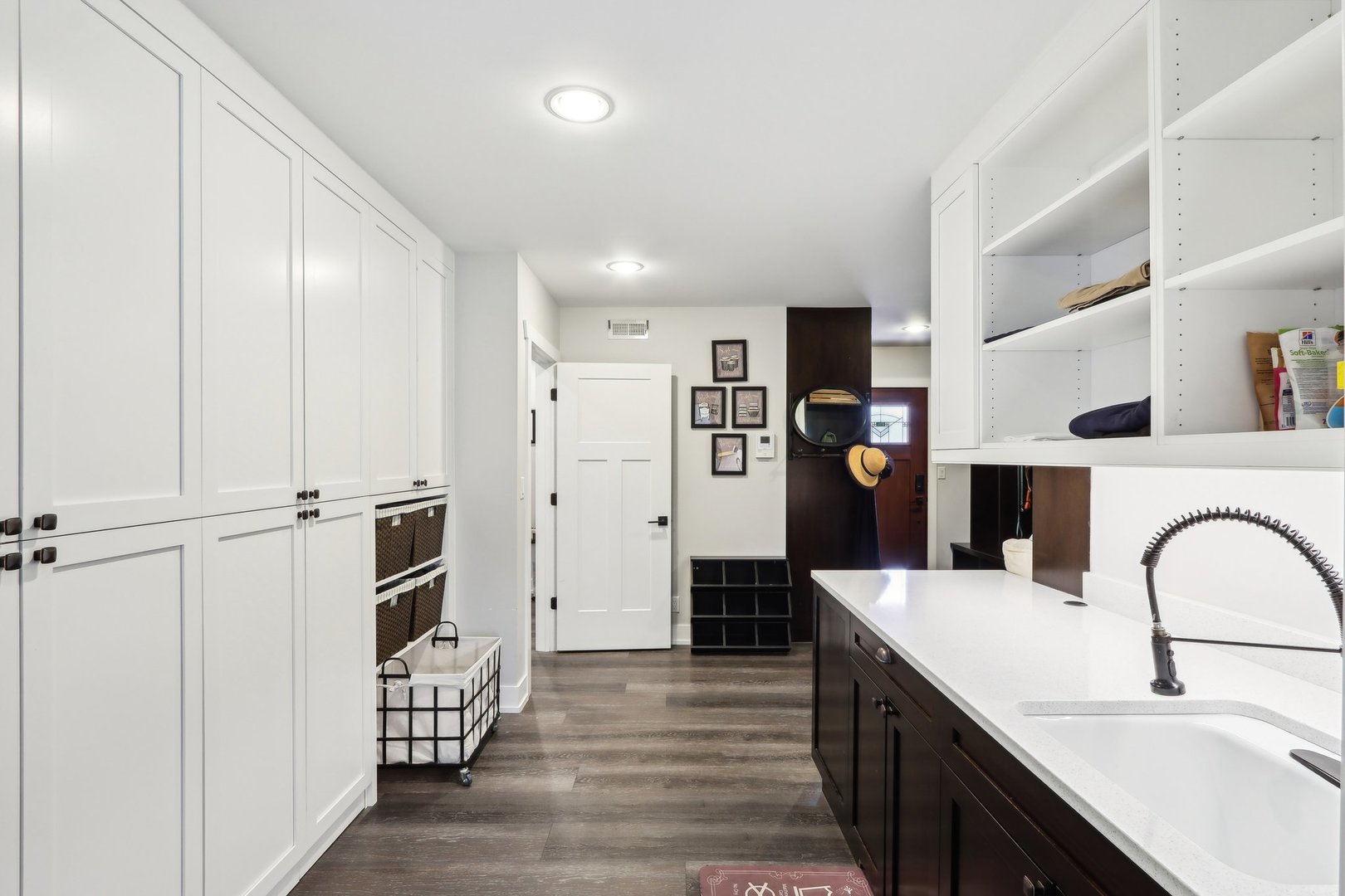598 Rockefeller Road Lake Forest, IL 60045 - Photo 19 of 86 a kitchen with stainless steel appliances kitchen island granite countertop a refrigerator and a sink