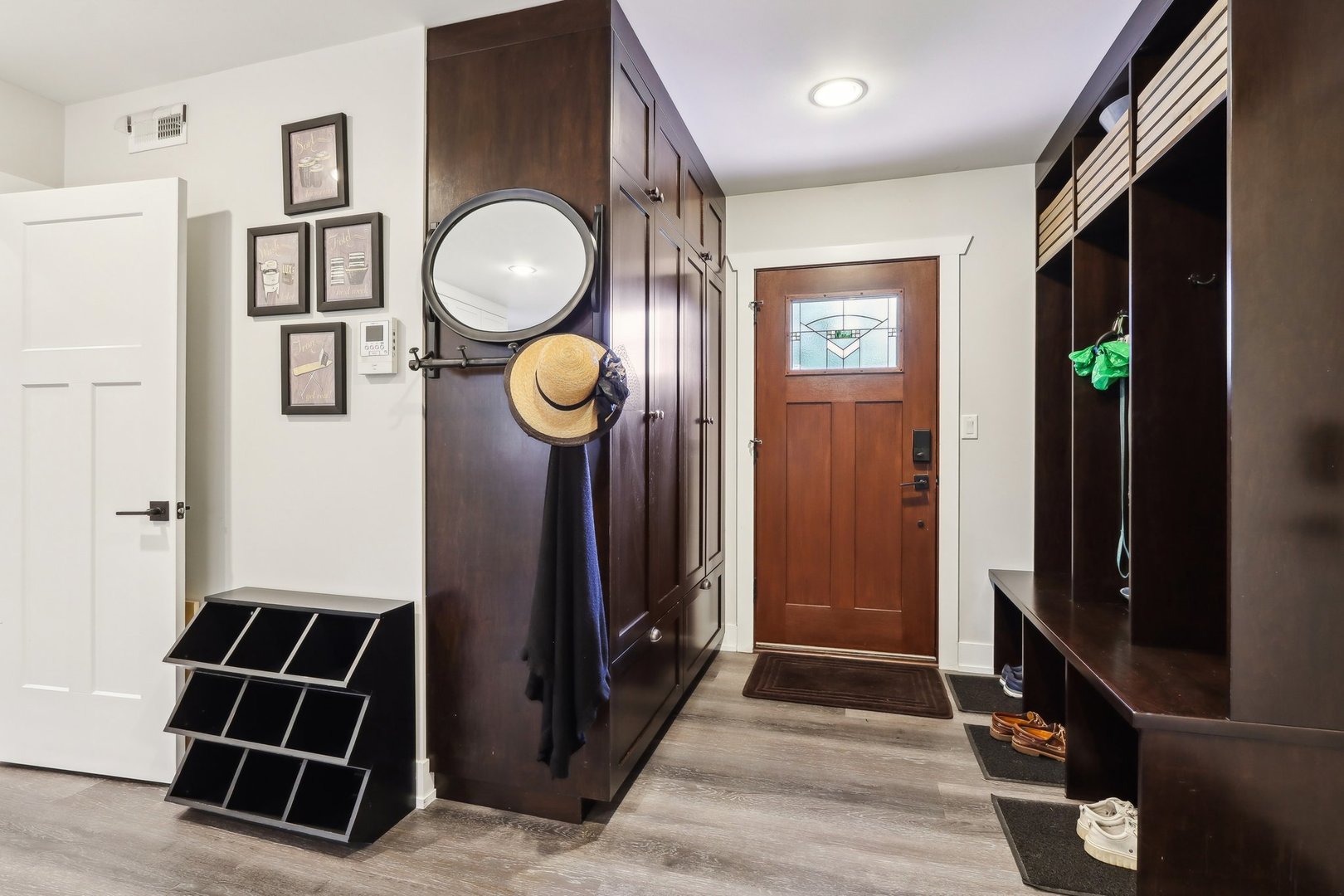 598 Rockefeller Road Lake Forest, IL 60045 - Photo 20 of 86 a view of a hallway with wooden floor and staircase