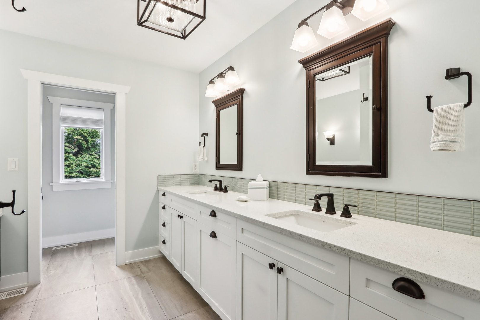 598 Rockefeller Road Lake Forest, IL 60045 - Photo 31 of 86 a bathroom with a double vanity sink mirror and