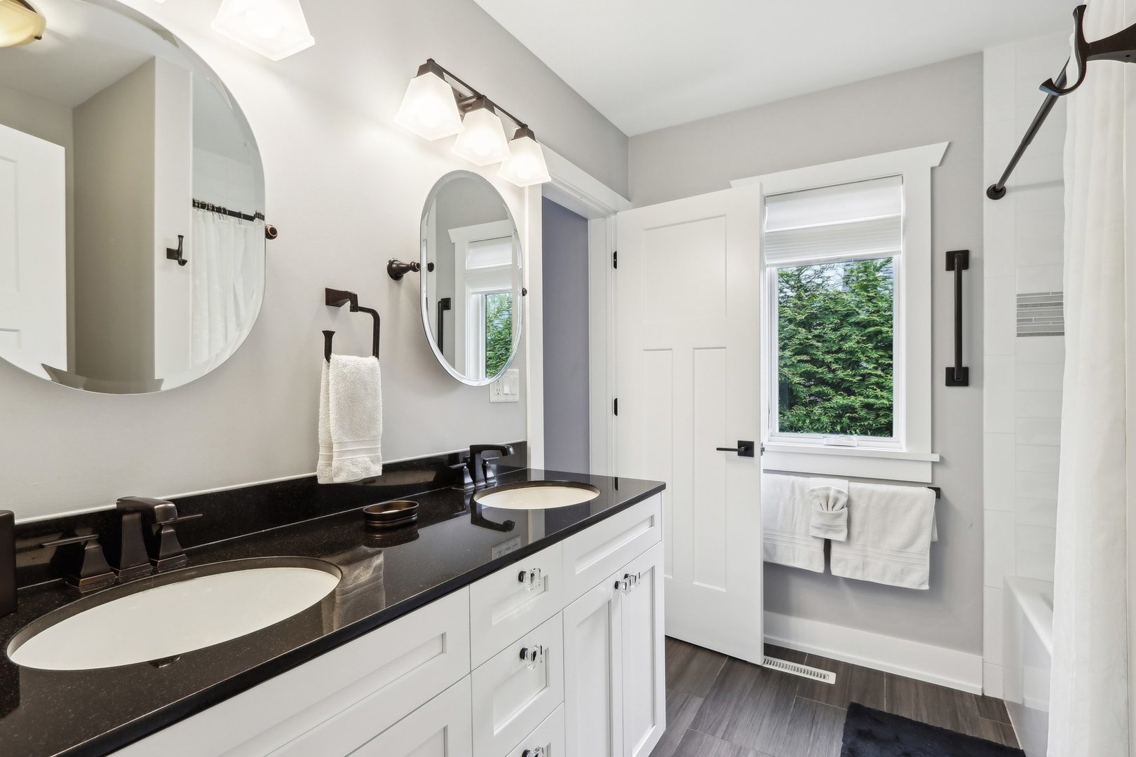 598 Rockefeller Road Lake Forest, IL 60045 - Photo 39 of 86 a bathroom with a granite countertop sink and a mirror