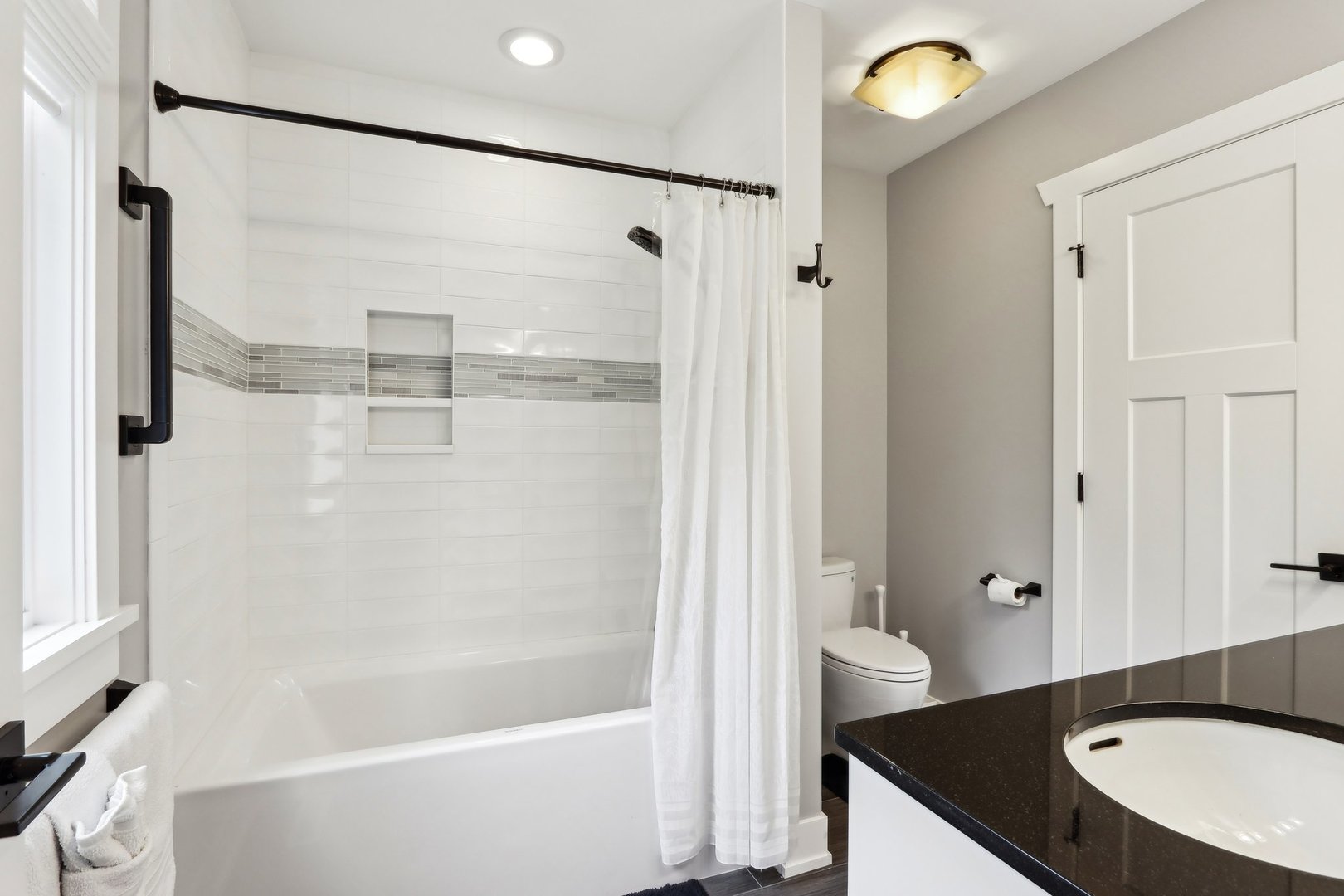 598 Rockefeller Road Lake Forest, IL 60045 - Photo 40 of 86 a bathroom with a granite countertop bathtub shower sink vanity and a toilet