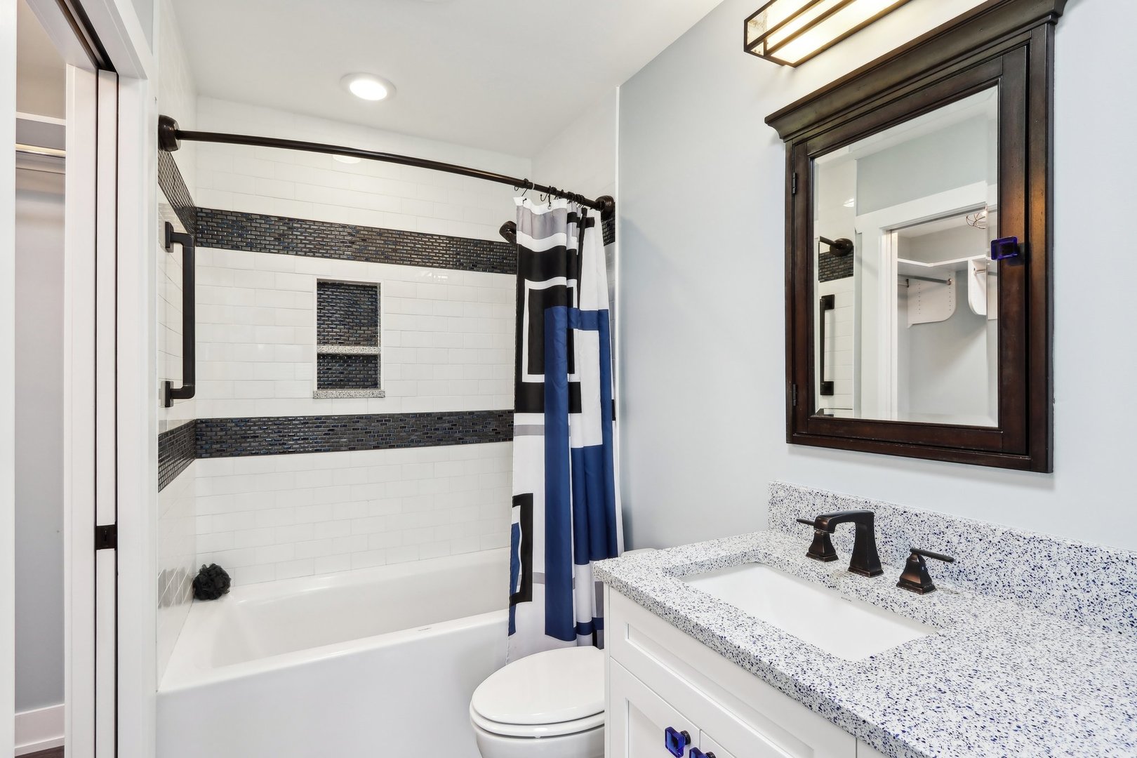 598 Rockefeller Road Lake Forest, IL 60045 - Photo 49 of 86 a bathroom with a granite countertop sink toilet and shower