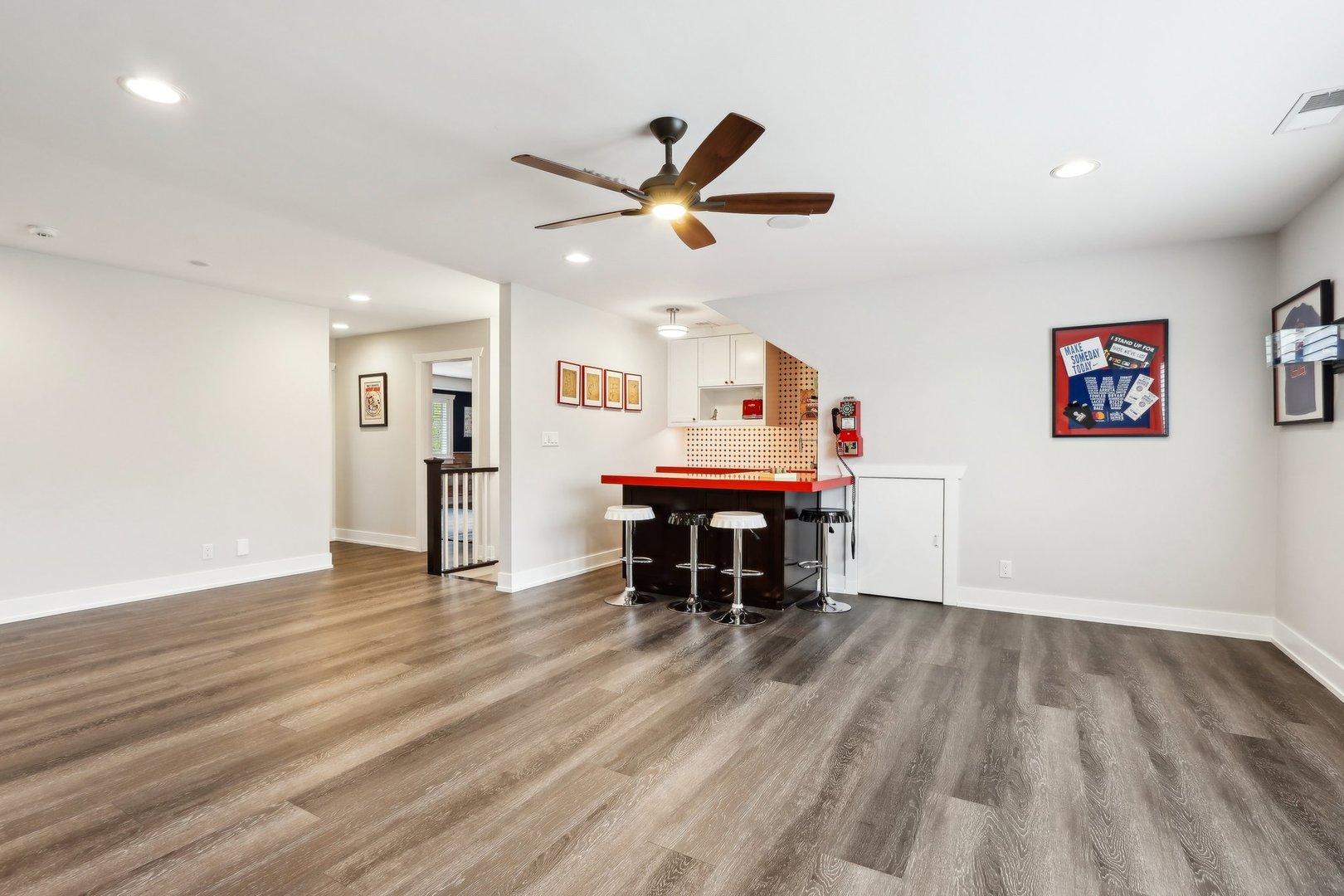 598 Rockefeller Road Lake Forest, IL 60045 - Photo 52 of 86 a dining room with wooden floor and a ceiling fan
