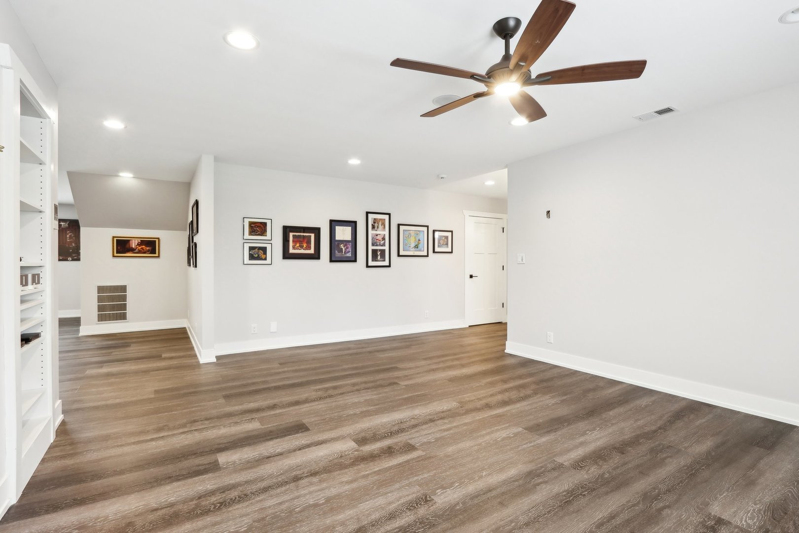 598 Rockefeller Road Lake Forest, IL 60045 - Photo 56 of 86 a view of an empty room with window and wooden floor