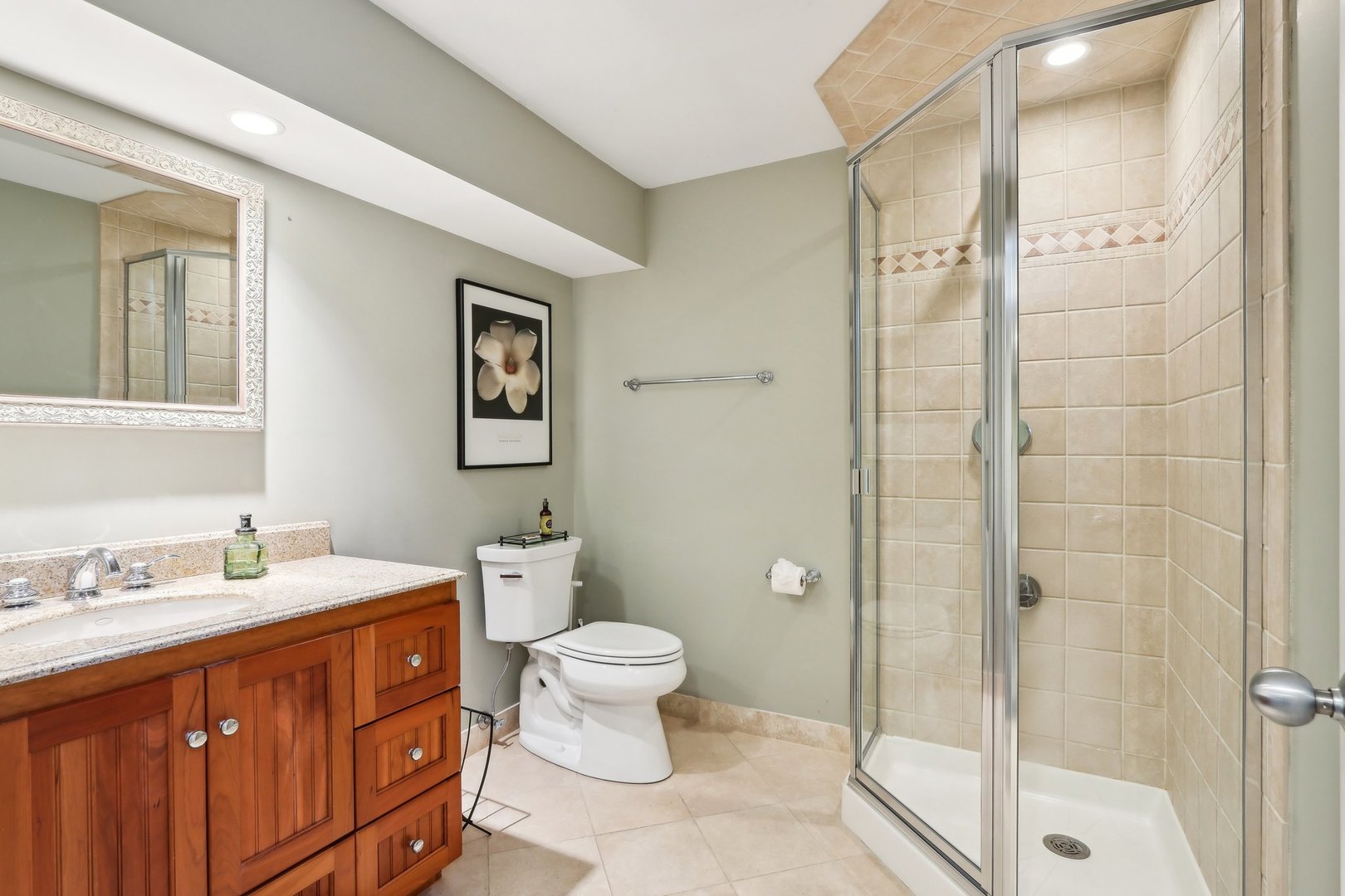 598 Rockefeller Road Lake Forest, IL 60045 - Photo 69 of 86 a bathroom with a double vanity sink toilet and shower