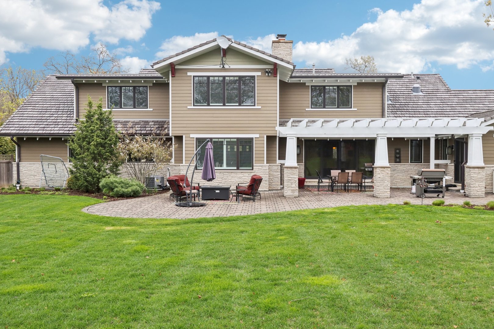 598 Rockefeller Road Lake Forest, IL 60045 - Photo 72 of 86 a view of a house with furniture and garden
