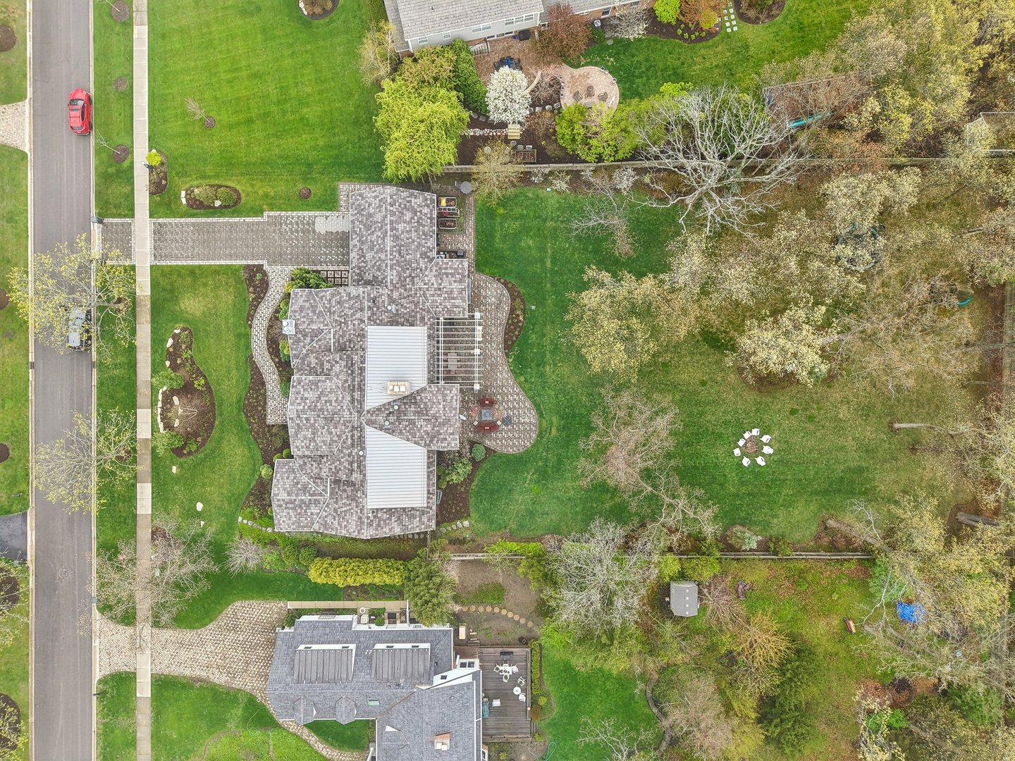 598 Rockefeller Road Lake Forest, IL 60045 - Photo 84 of 86 an aerial view of a house with a yard basket ball court and outdoor seating