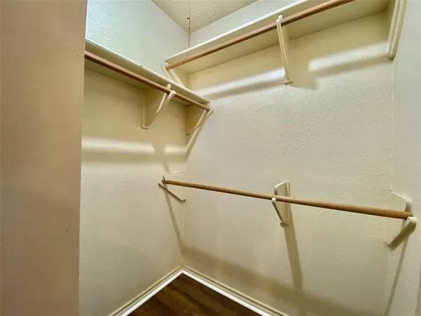 a view of a room with racks on the wall