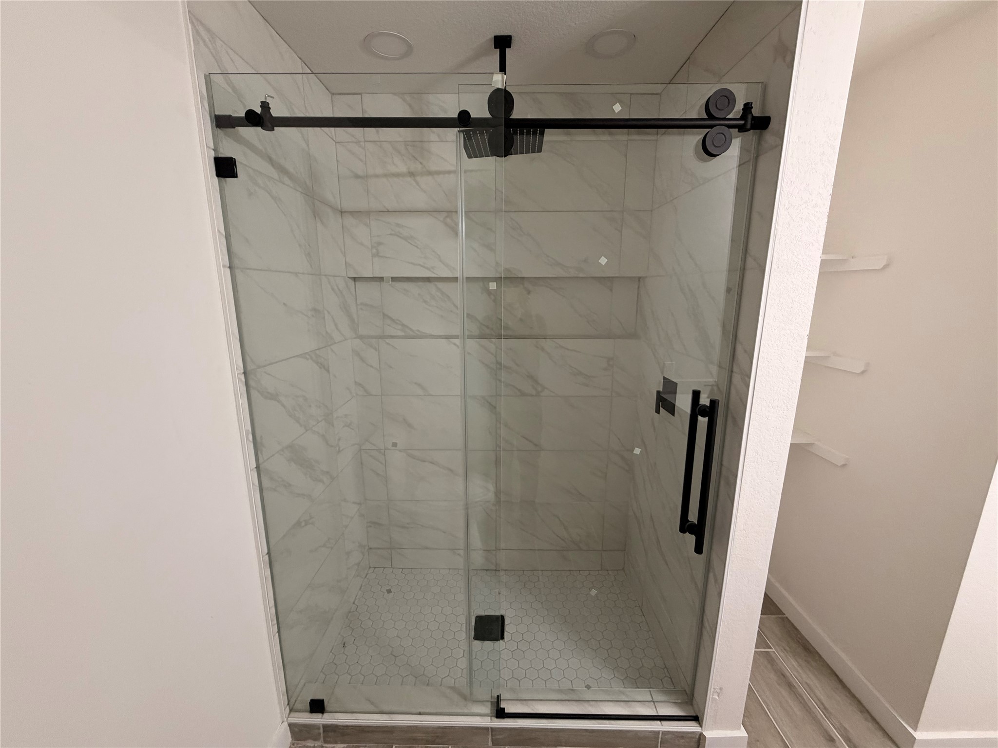 5842 Beldart Street Houston, TX 77033 - Photo 14 of 24 a bathroom with a shower