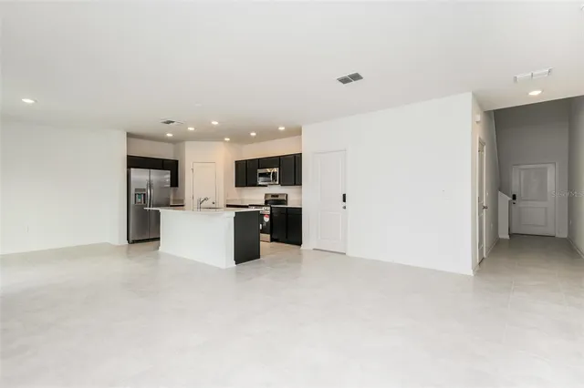 a view of a kitchen with a sink