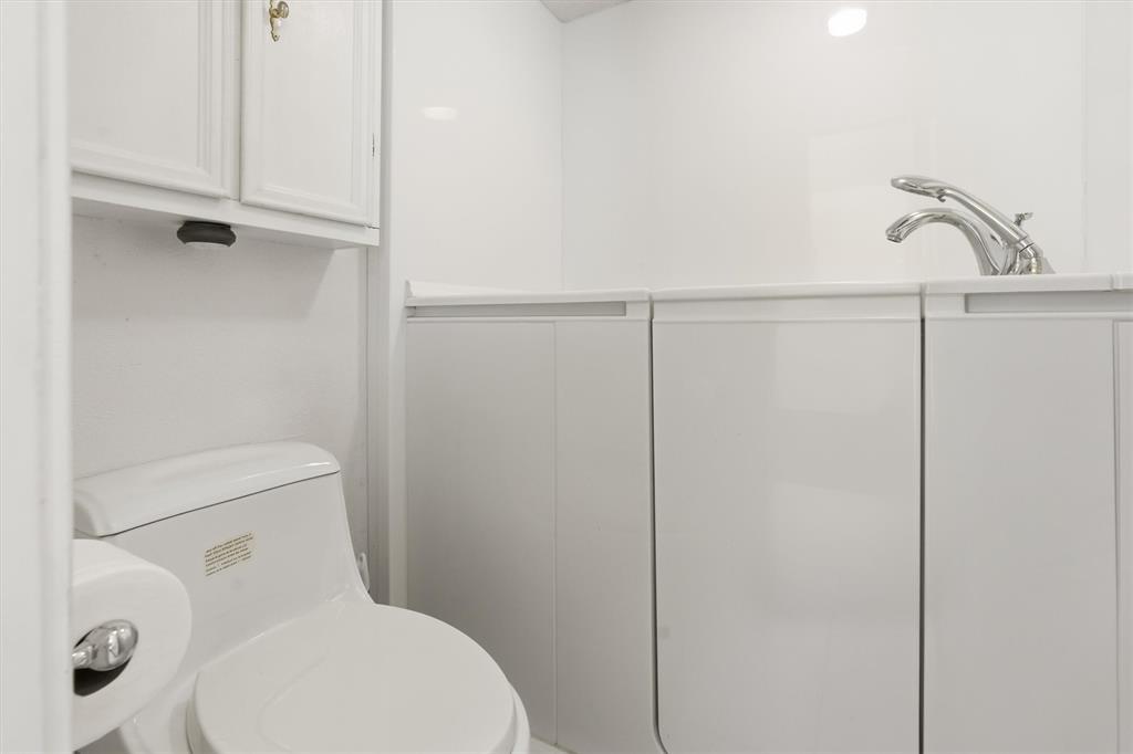 1817 Indian School Road Garland, TX 75044 - Photo 21 of 40 Bathroom featuring toilet