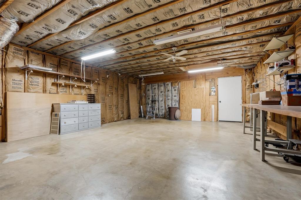 1817 Indian School Road Garland, TX 75044 - Photo 33 of 40 Below grade area featuring wood walls