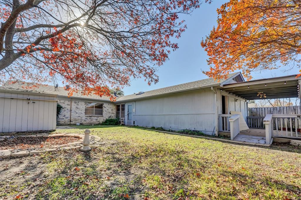 1817 Indian School Road Garland, TX 75044 - Photo 37 of 40 Back of property featuring a wooden deck