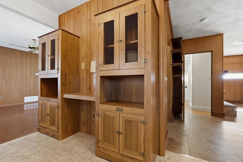 1817 Indian School Road Garland, TX 75044 - Photo 4 of 40 Detailed view of wood walls